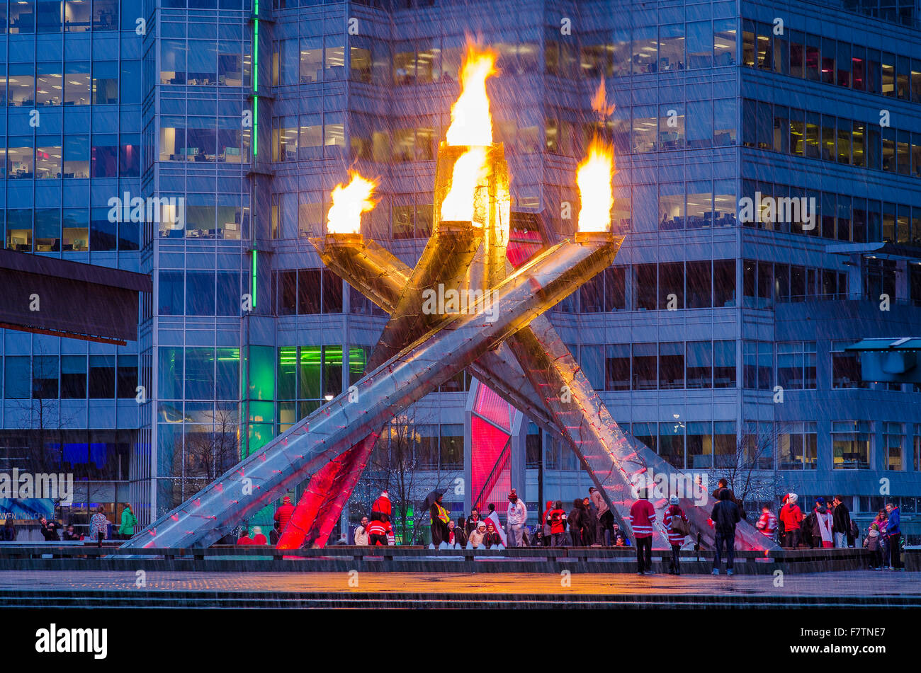 Canadians celebrate the 2014 Olympic Hockey gold medals by gathering at the 2010 Olympic flame cauldron in Vancouver, British Co Stock Photo