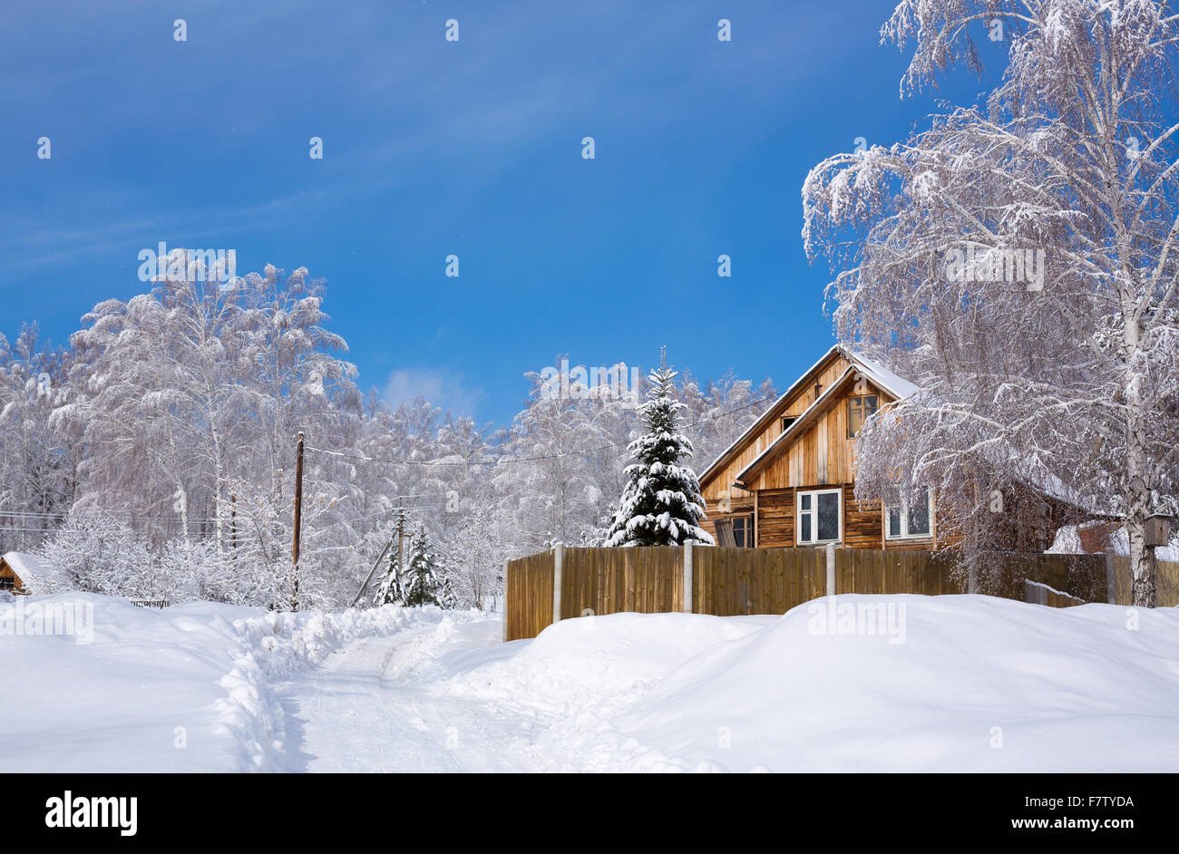 Wooden house in winter Stock Photo