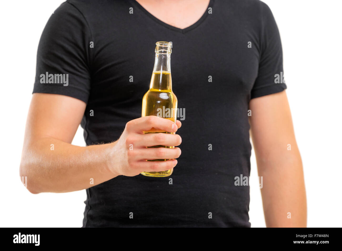 Cheers! Close up of male hand holding bottle of beer. Isolated on white. Stock Photo