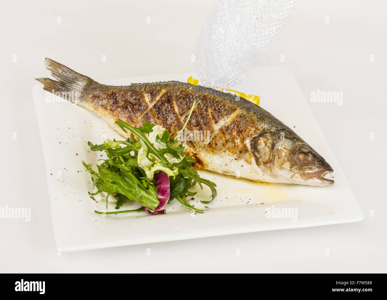 Seabass with vegetables Stock Photo Alamy