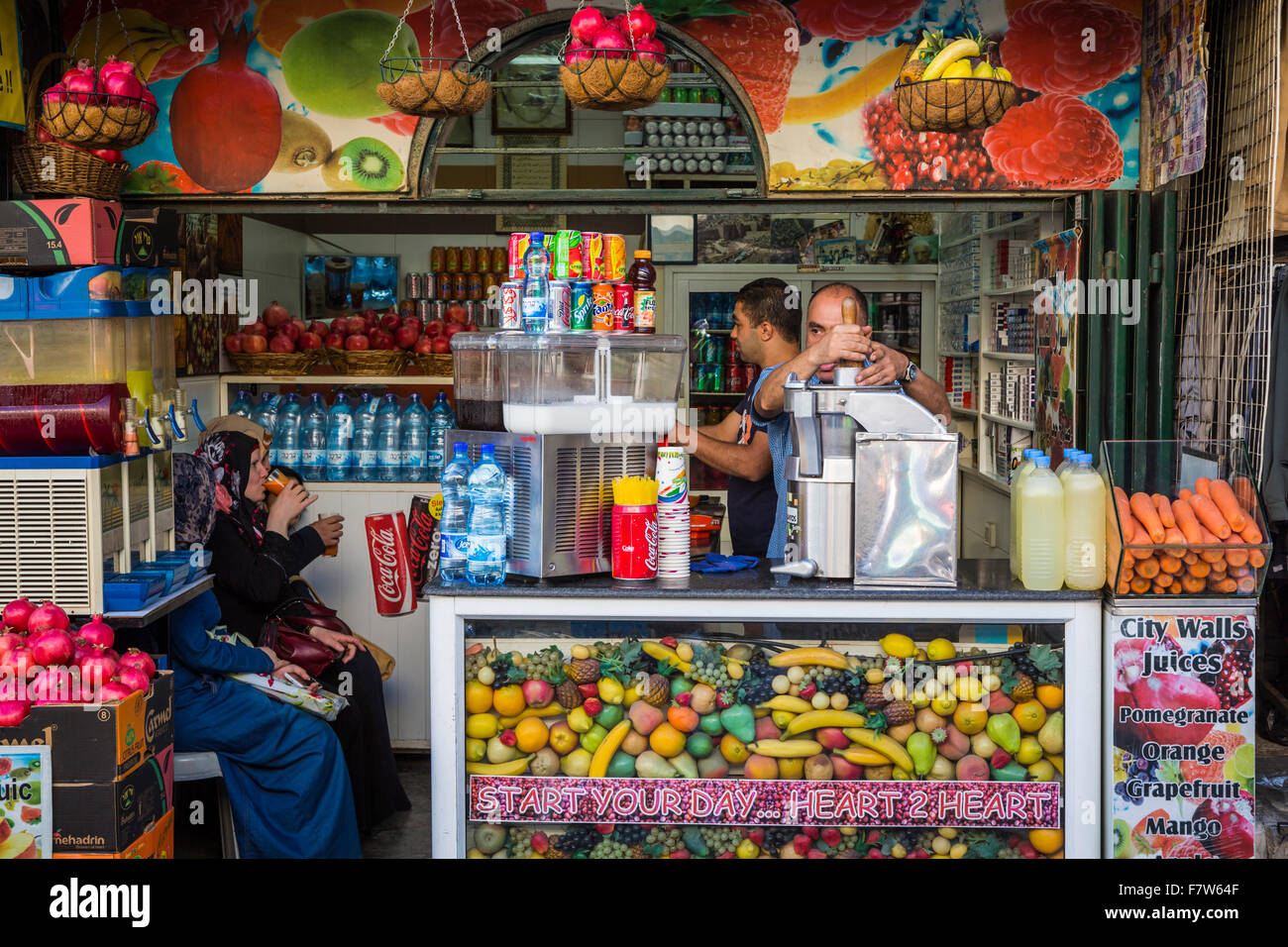 A fresh fruit juice kiosk in the Arab street market near ...
