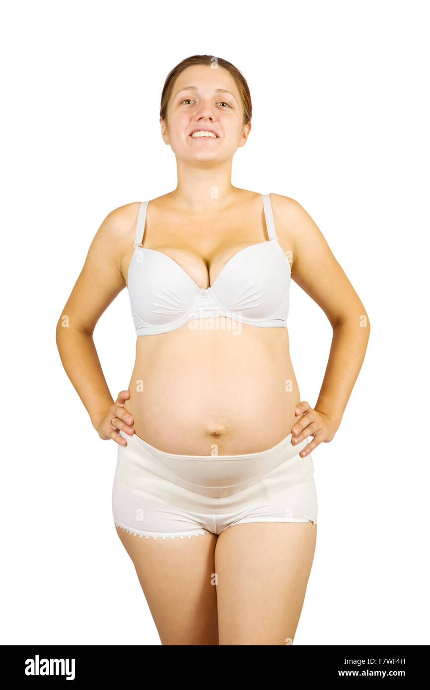 pregnant woman wearing obstetrical binder. Isolated over white Stock Photo