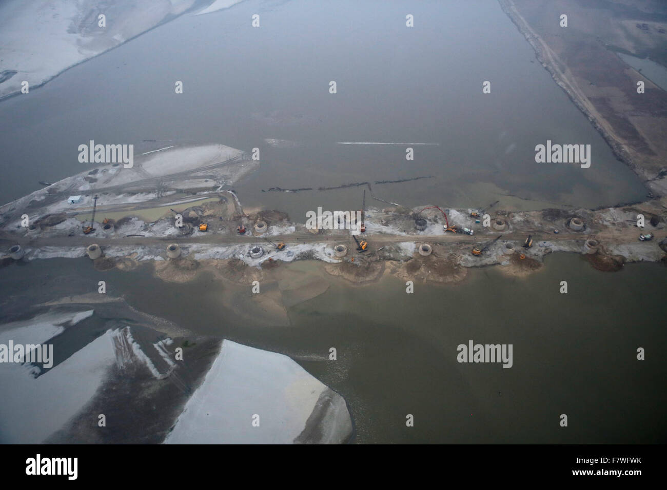 Aerial view of the underconstruction bridge on Ganges river between
