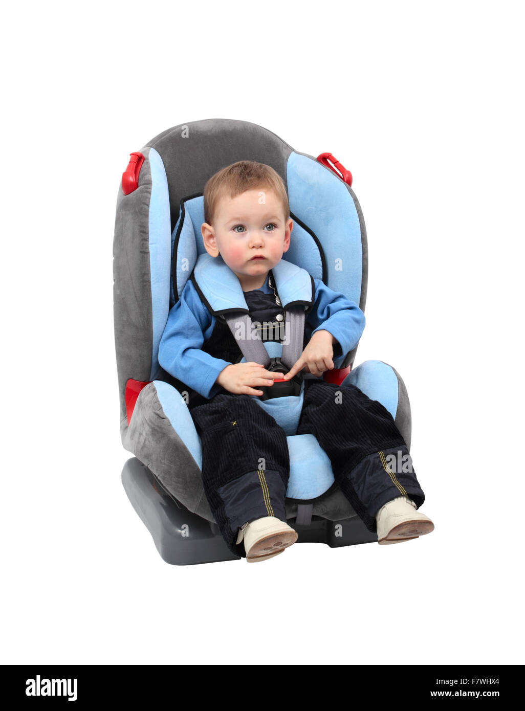 Baby boy in car seat. Isolated with clipping path. Stock Photo
