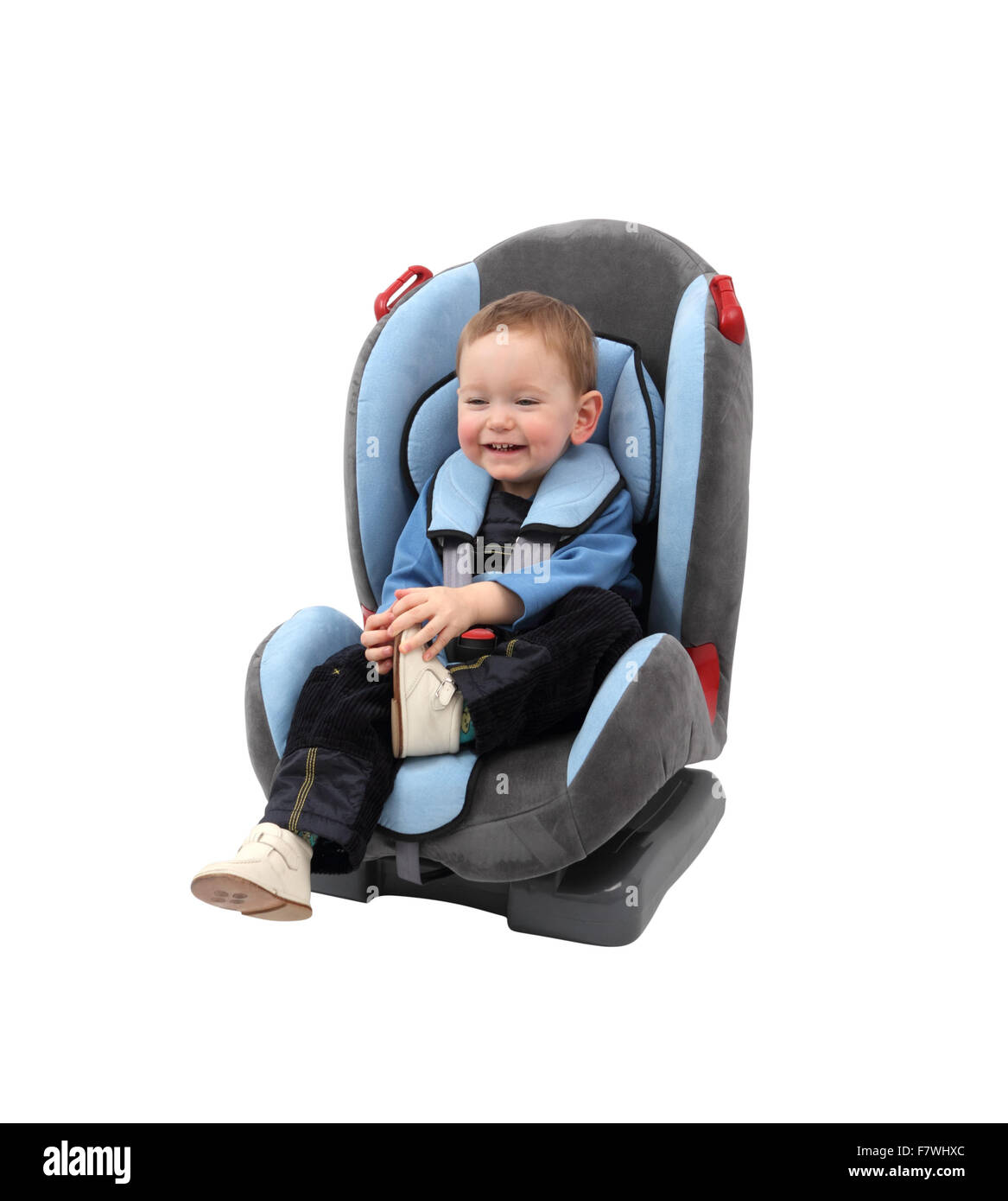 Baby boy in car seat. Isolated with clipping path. Stock Photo