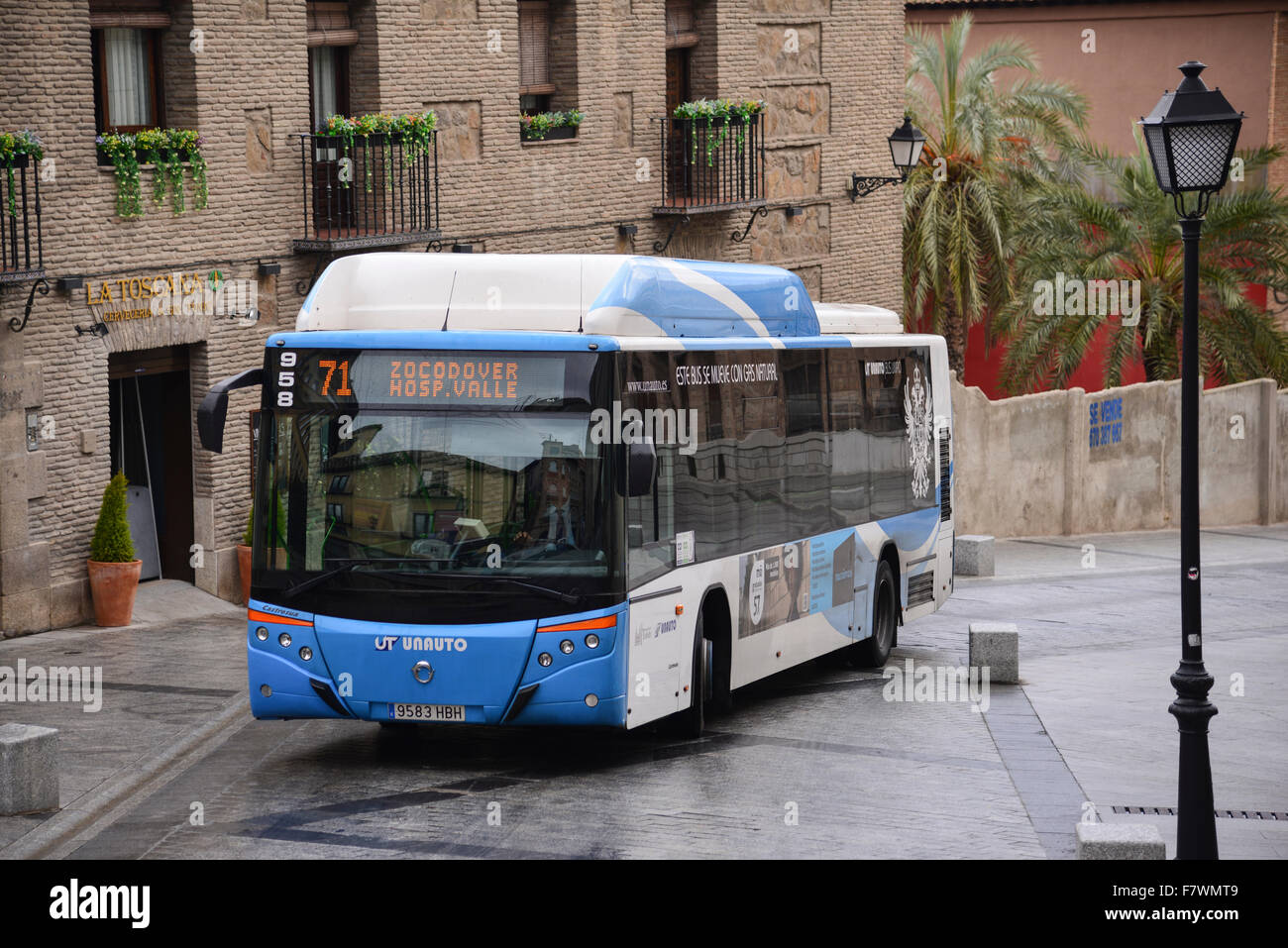 Bus Running in Toledo, Spain Stock Photo