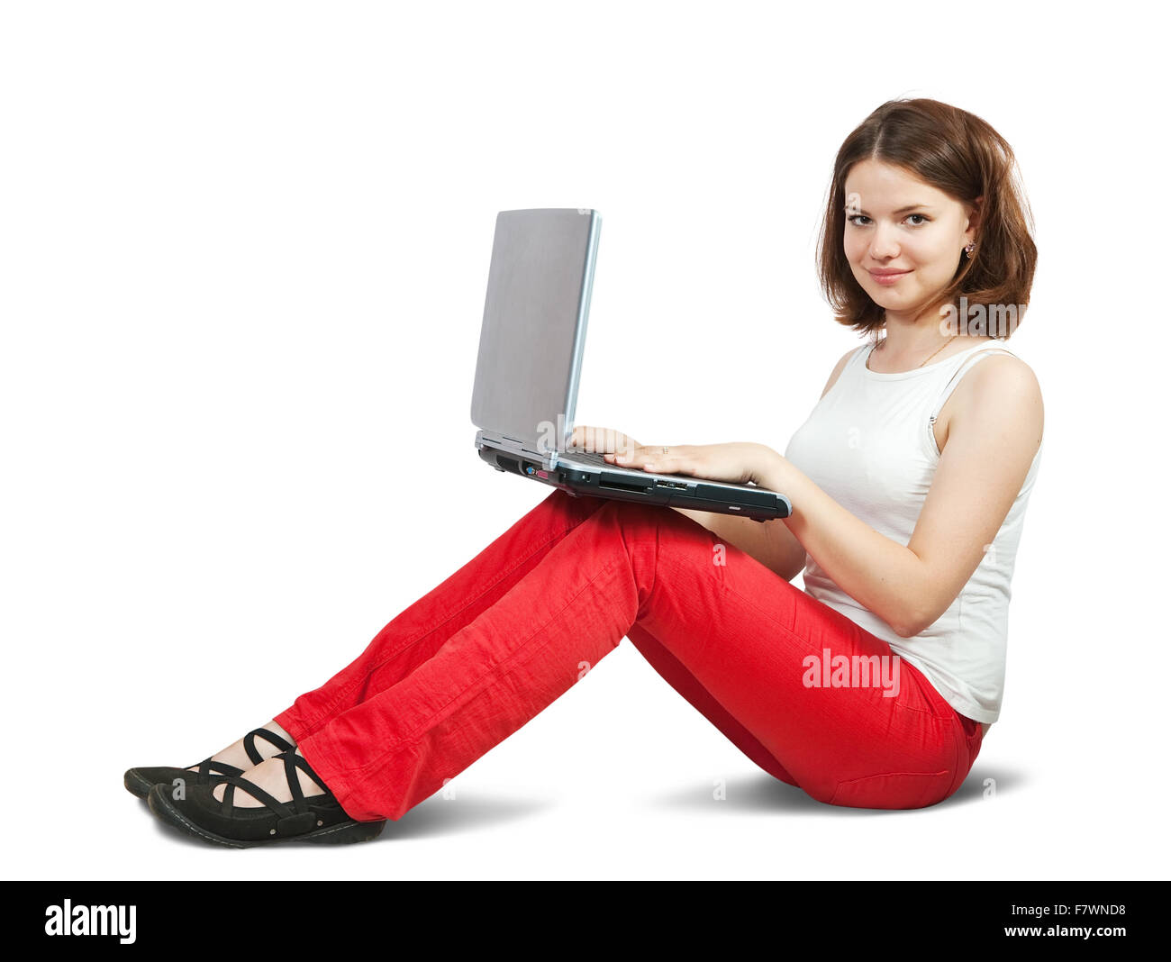 pretty young girl with laptop. Isolated over white Stock Photo - Alamy