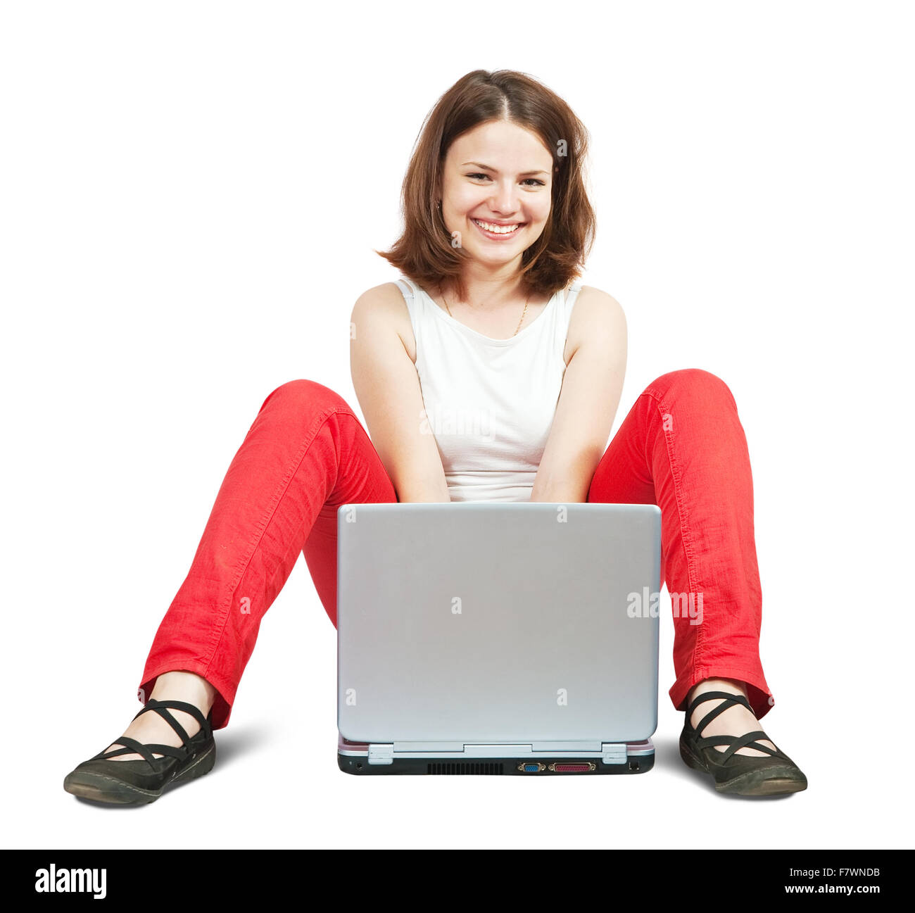 Young girl working with laptop. Isolated over white Stock Photo - Alamy