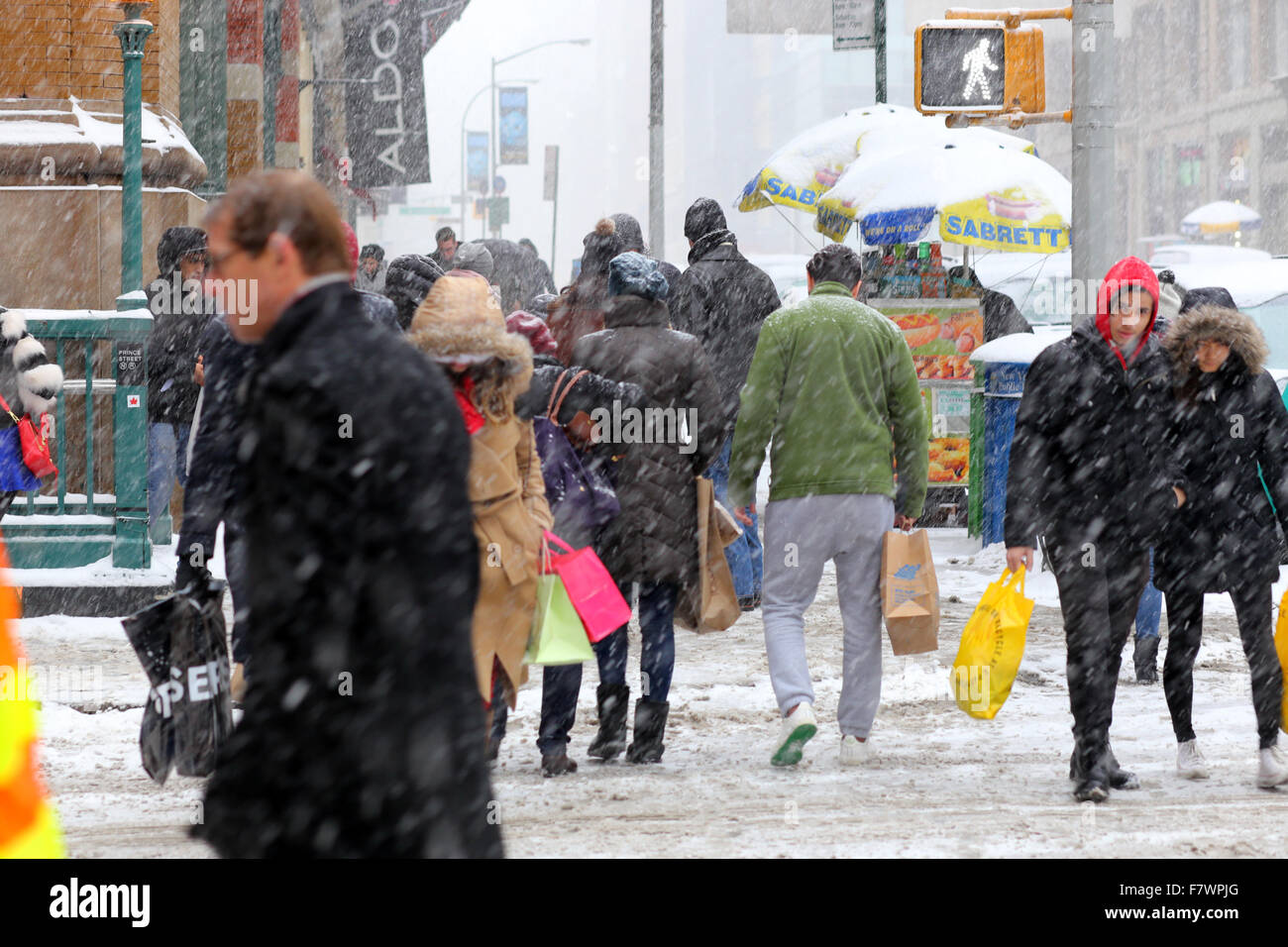 A snowy winter day in New York City. On the corner of Prince and Broadway, March 1, 2015 Stock Photo