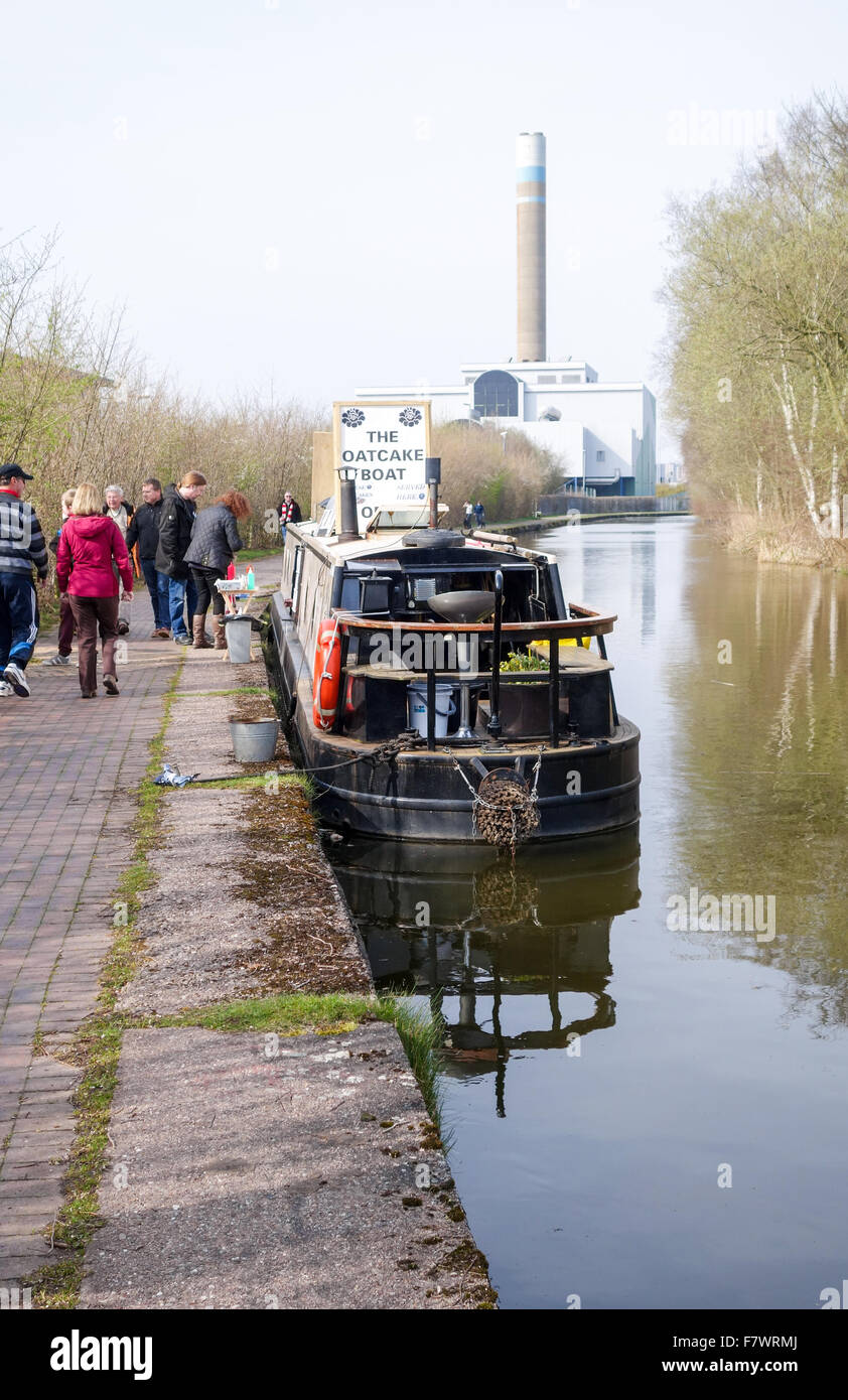 A narrow boat or barge called The B'oatcake on the canal at Stoke on trent selling a North Staffordshire delicacy called an Oatcake Stoke, England, UK Stock Photo