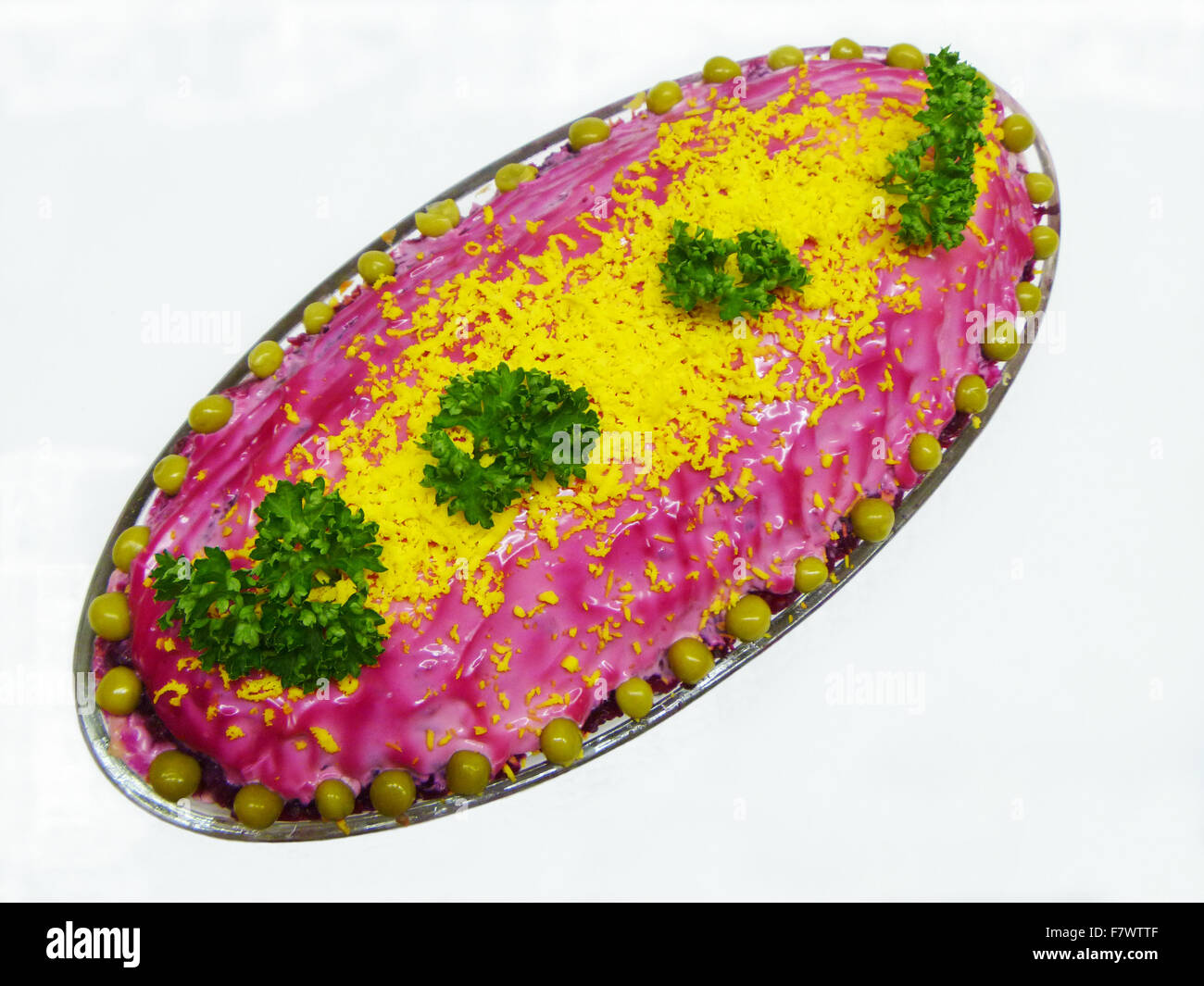 Salad on plate is insulated on light background Stock Photo