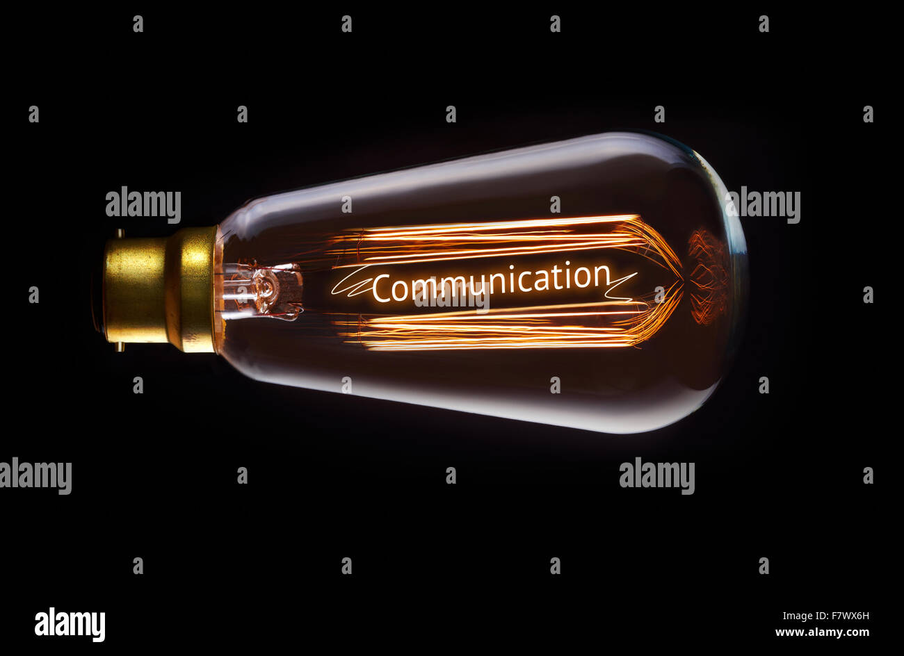 Good Communication concept in a filament lightbulb. Stock Photo
