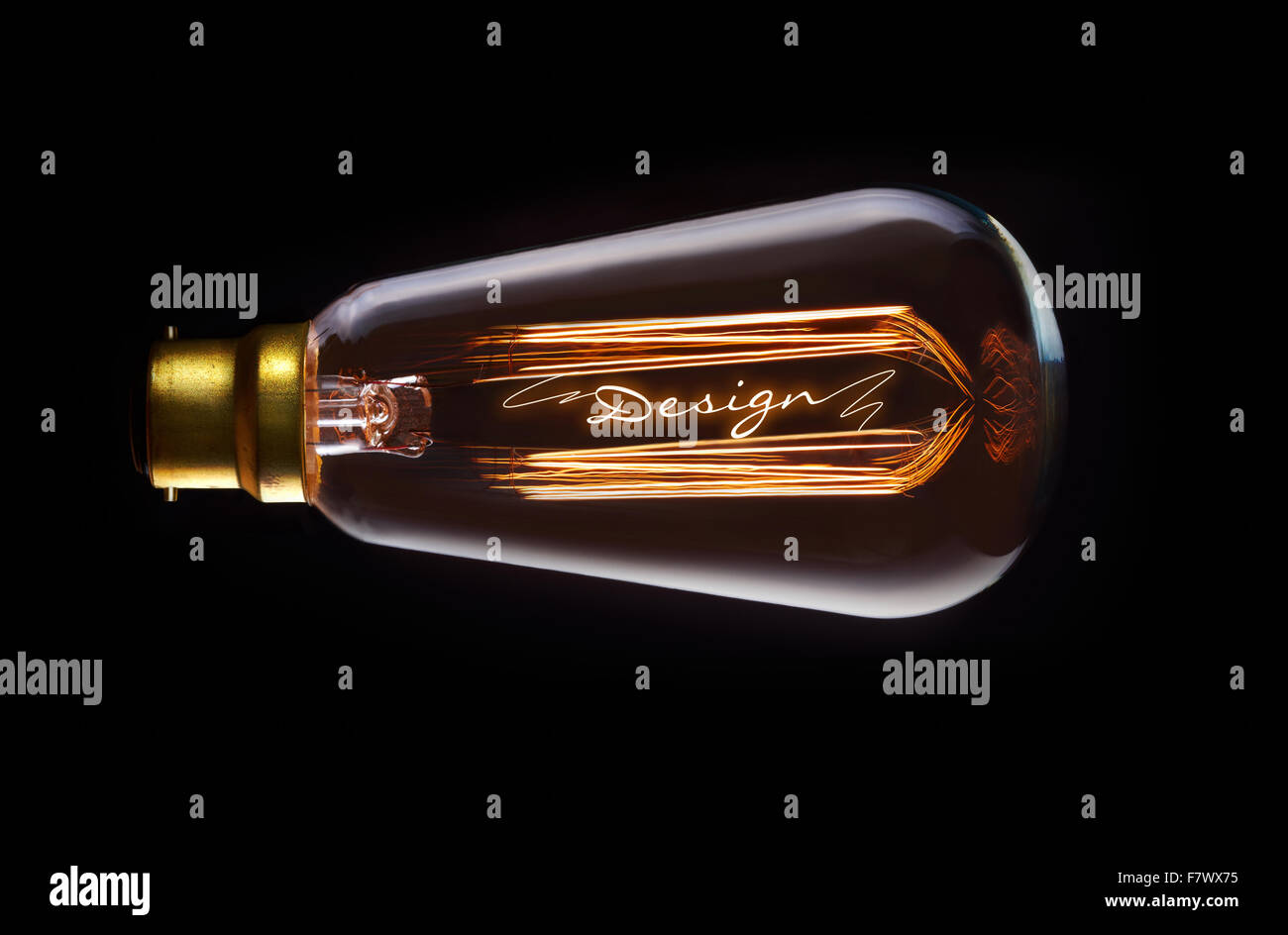 Design concept in a filament lightbulb. Stock Photo