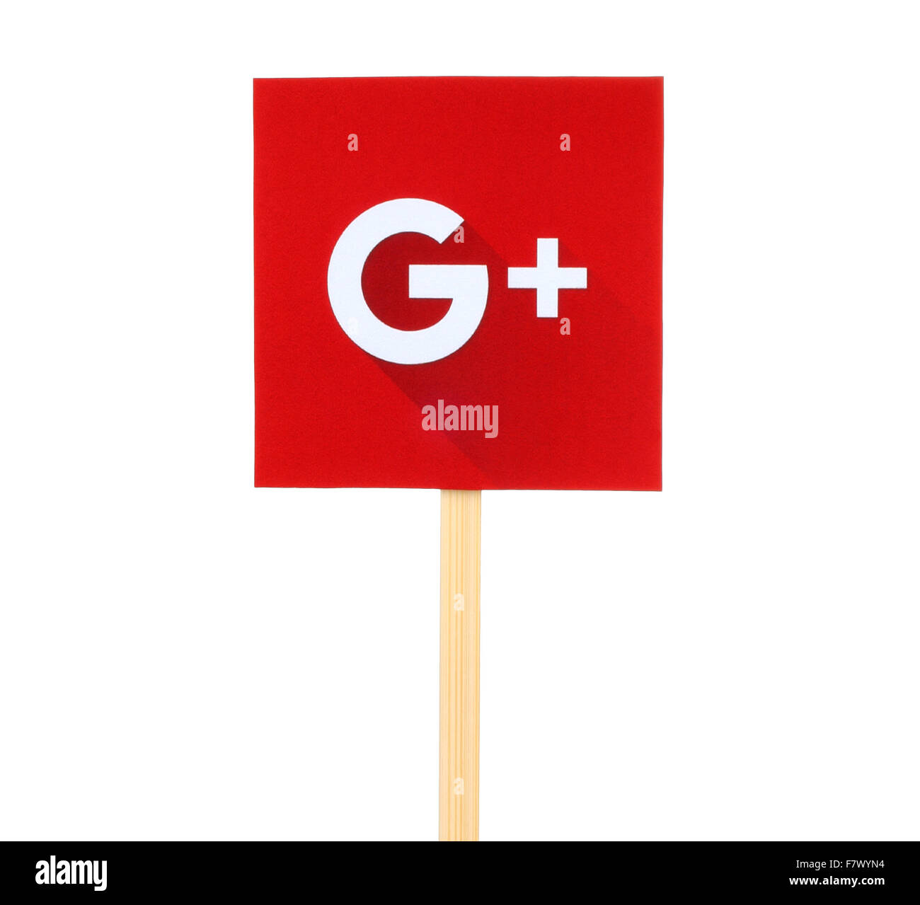 Kiev, Ukraine - October 07, 2015: New Google Plus logo sign printed on paper, cut and pasted on wooden stick. Stock Photo