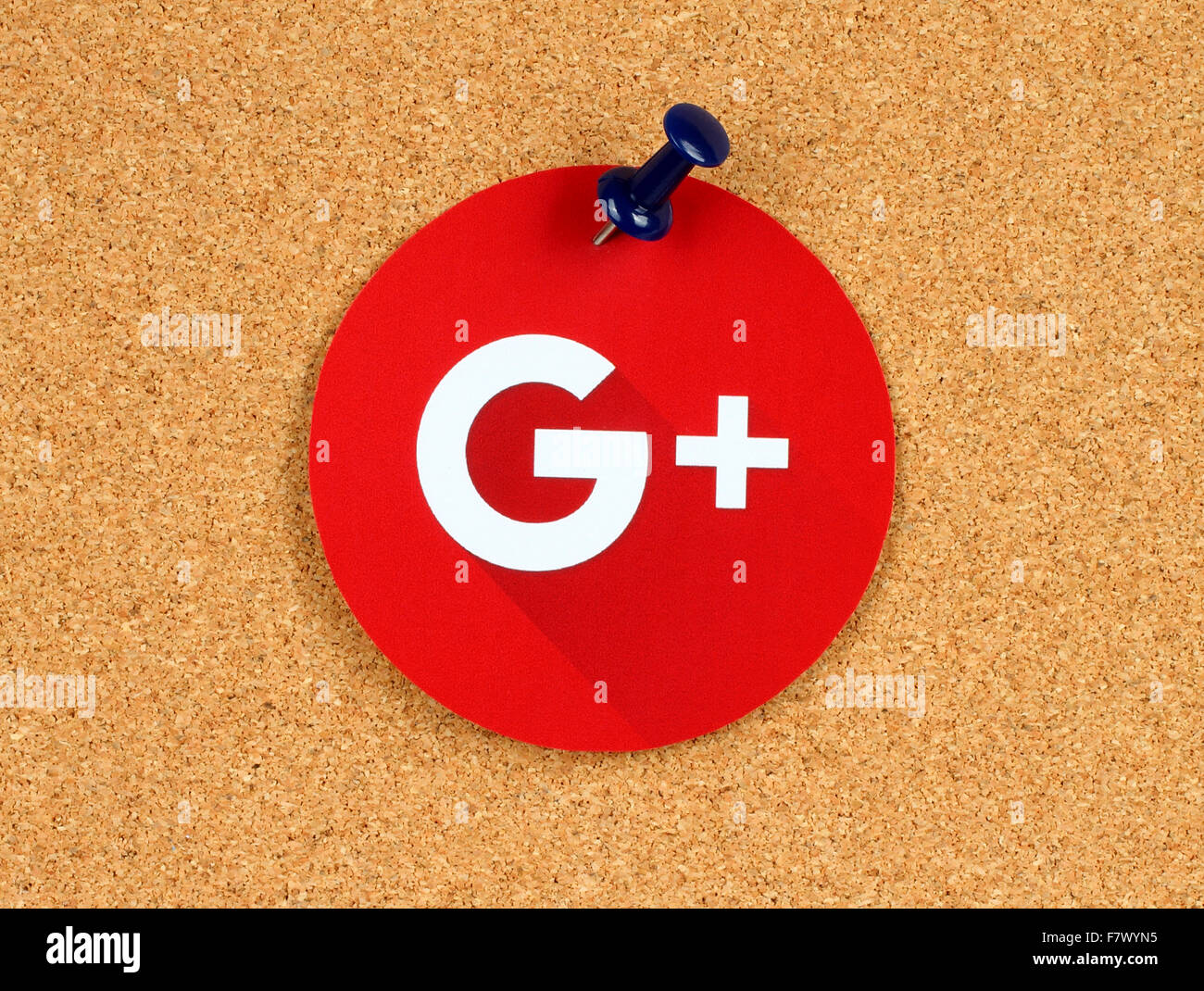 Kiev, Ukraine - October 07, 2015: New Google Plus logo sign printed on paper, cut and pinned on cork bulletin board. Stock Photo
