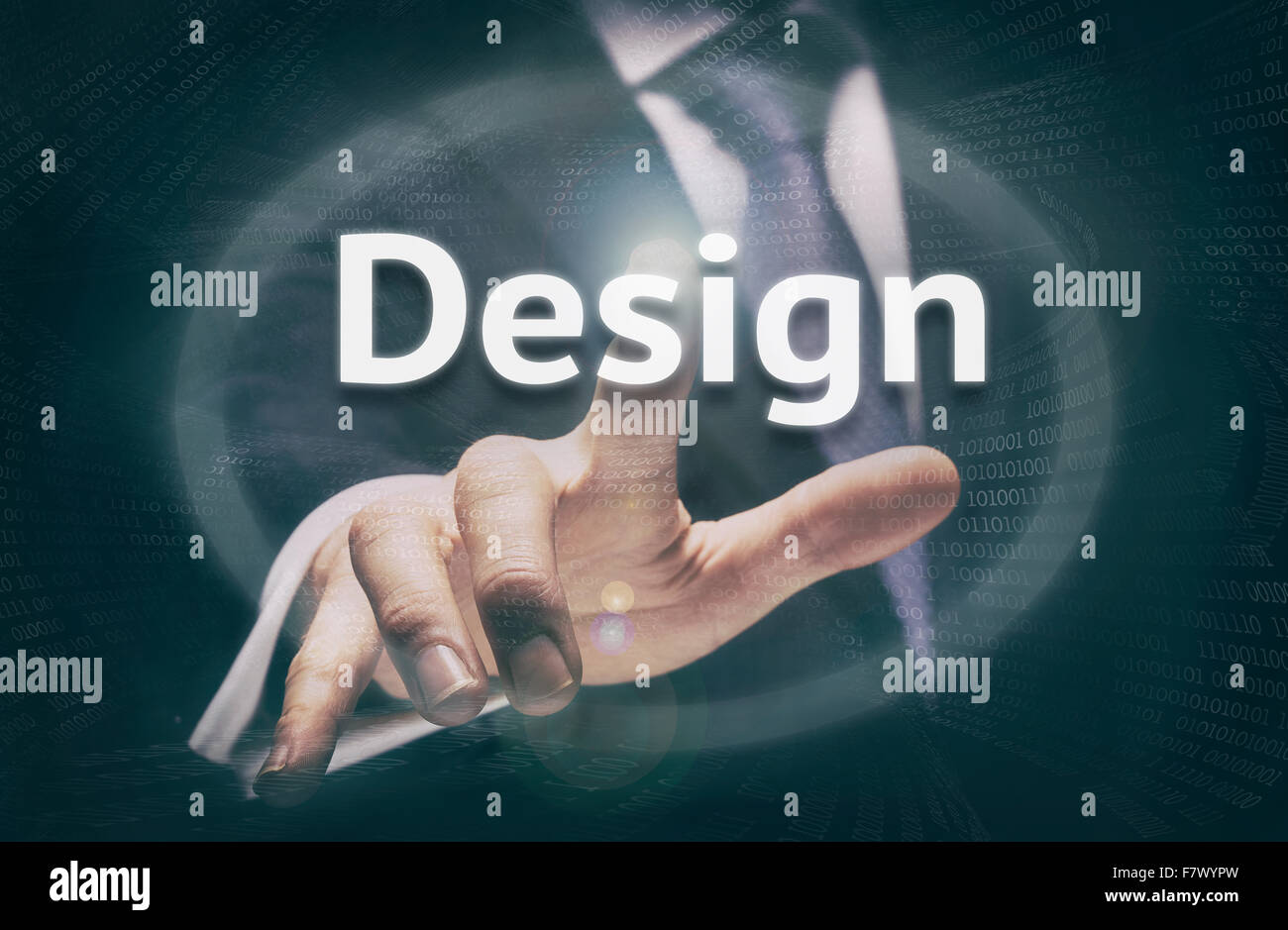 Businessman pressing a Design concept button. Stock Photo
