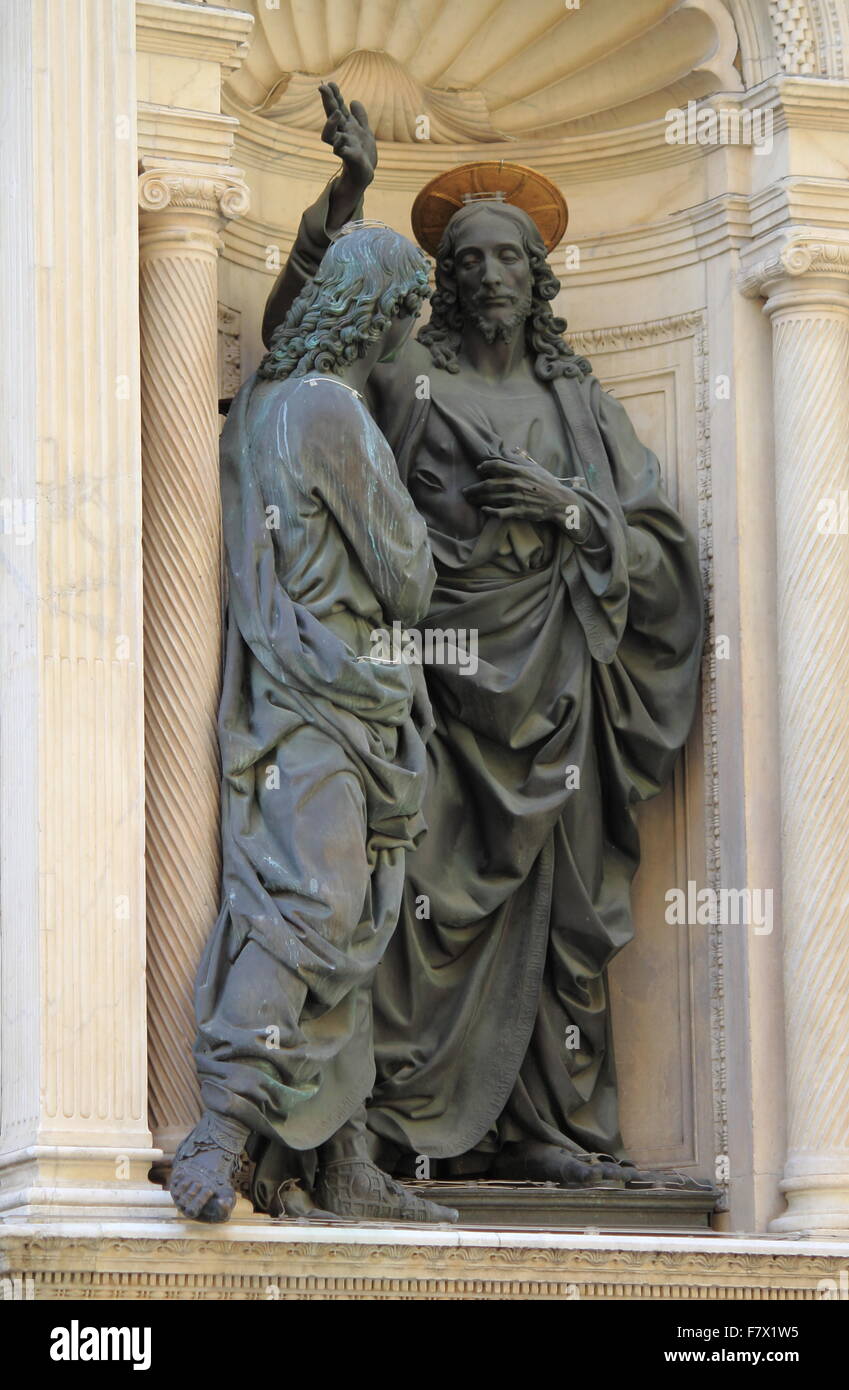 Statue of Jesus shows his wounds to a doubting Thomas in Orsanmichele church. Florence, Italy Stock Photo