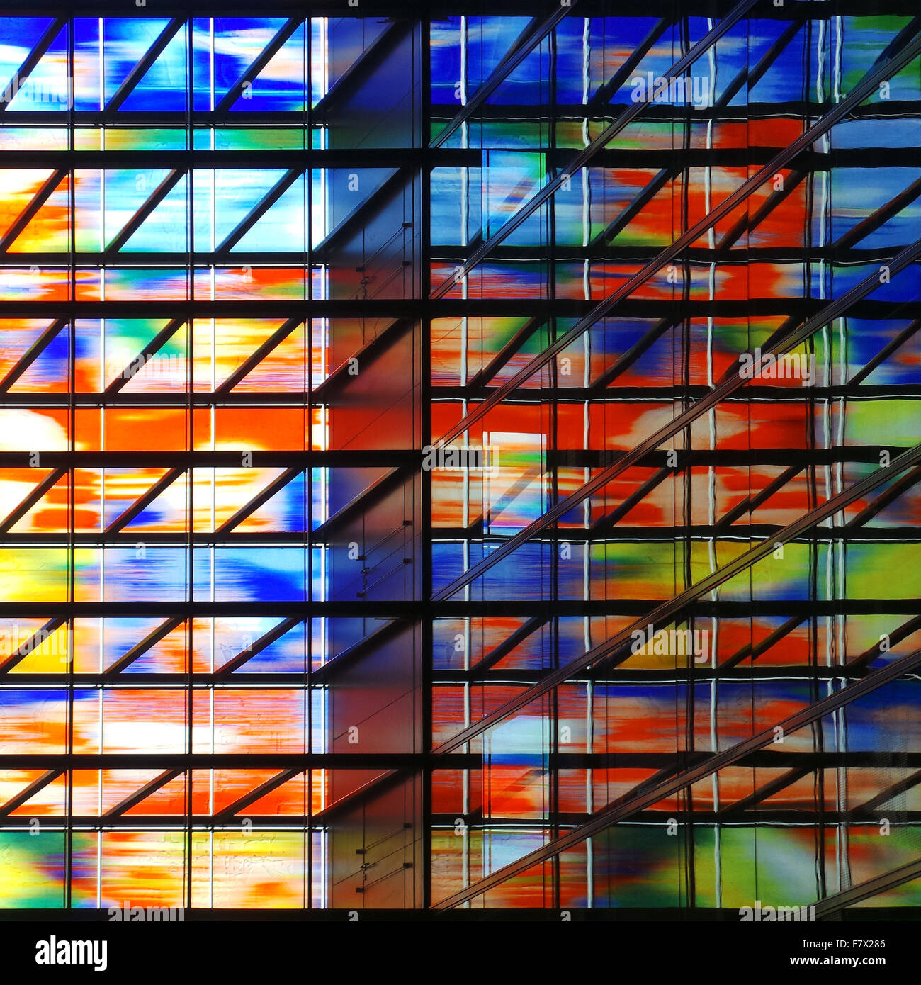 Colorful windows of a high rise building Stock Photo