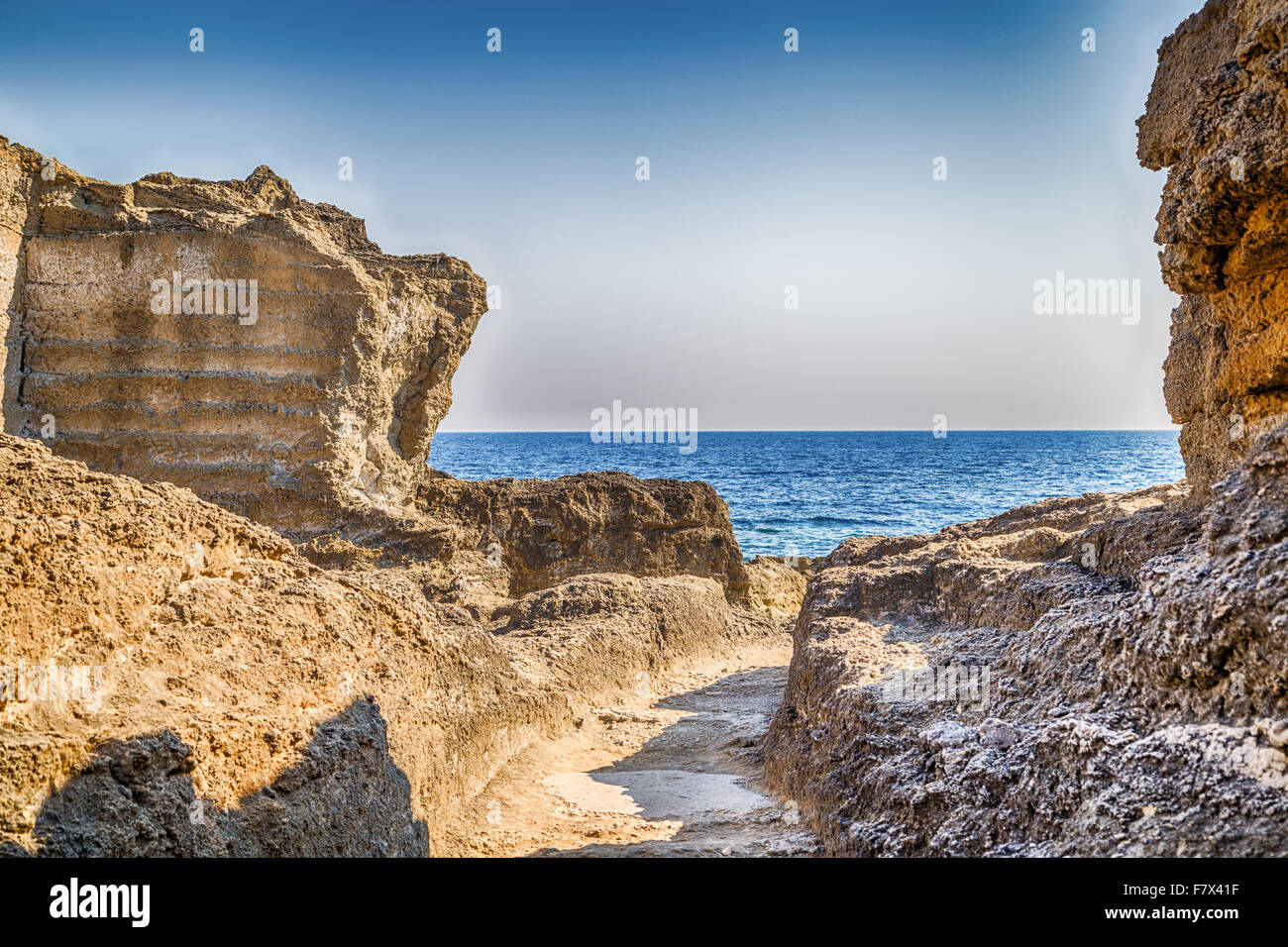 rocks and coves of the coast of Salento of the Ionian Sea in Italy,  near Tricase, Lecce, Apulia Stock Photo