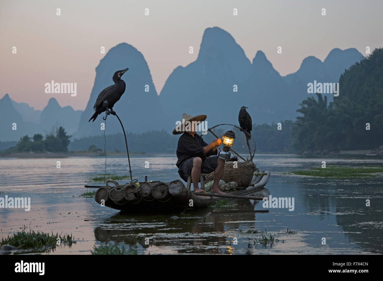 Cormorant Fisherman on River Li Guilin Region Guangxi, China LA008355 Stock Photo