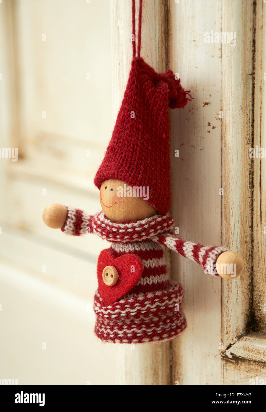 Christmas ornament hanging on a wooden door Stock Photo