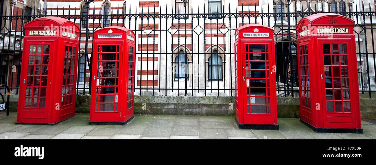 Red telephone boxes in a row, London, England, UK Stock Photo