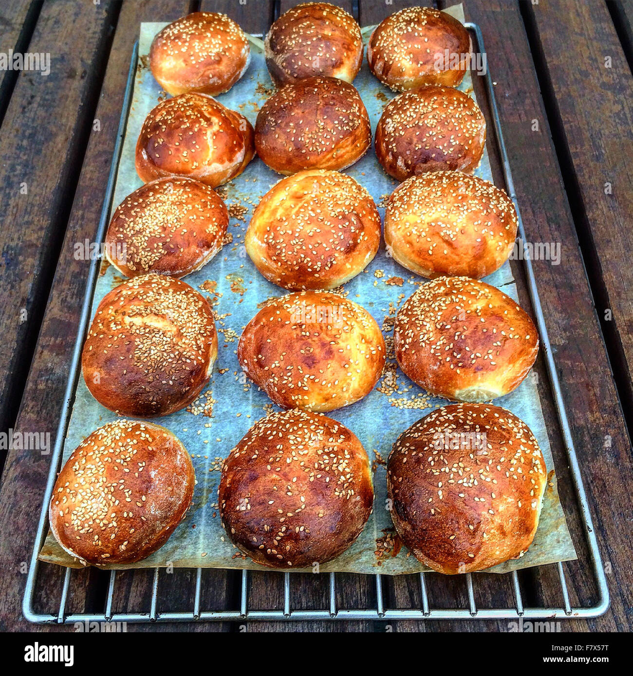 Bread rolls on wire rack Stock Photo Alamy