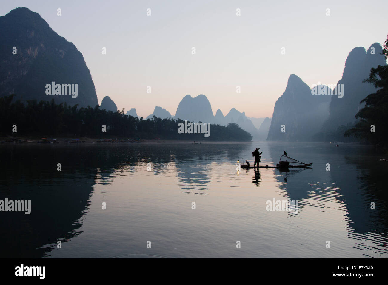 Cormorant Fisherman on River Li Guilin Region Guangxi, China LA008363 Stock Photo