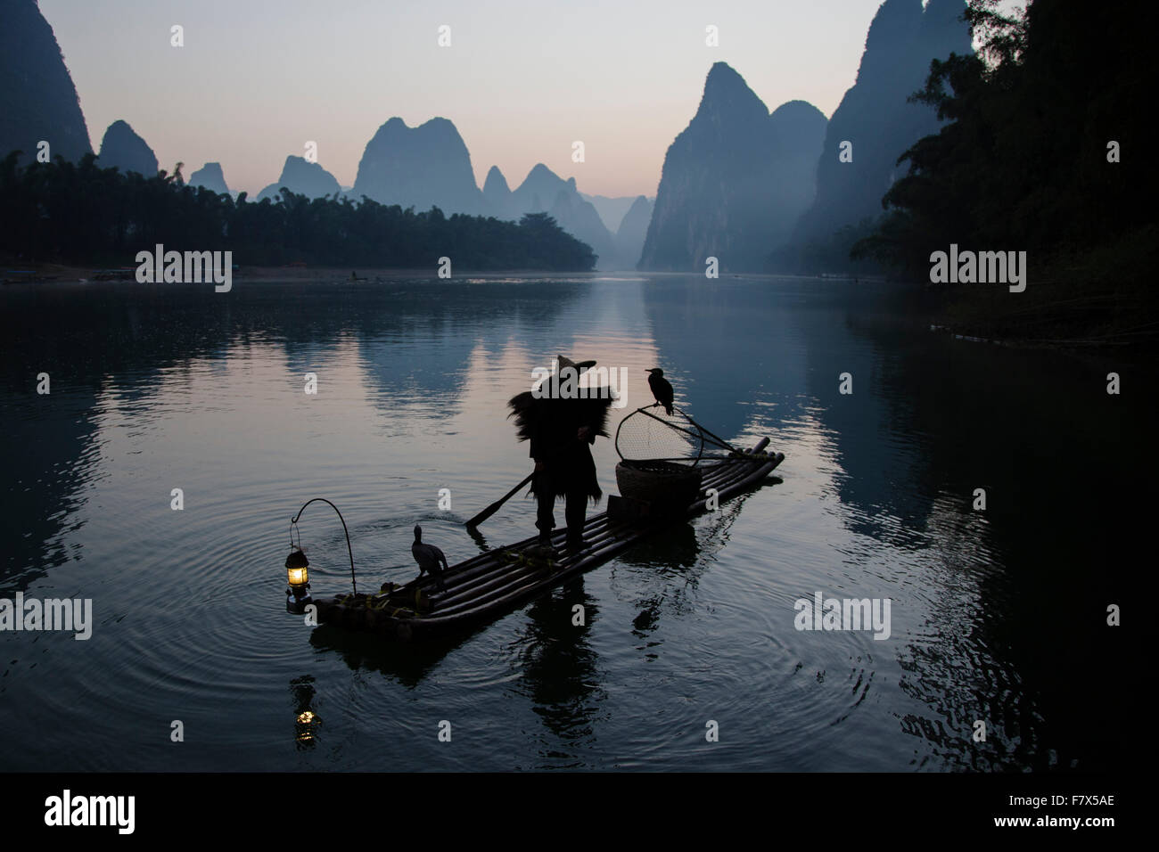 Cormorant Fisherman on River Li Guilin Region Guangxi, China LA008367 Stock Photo