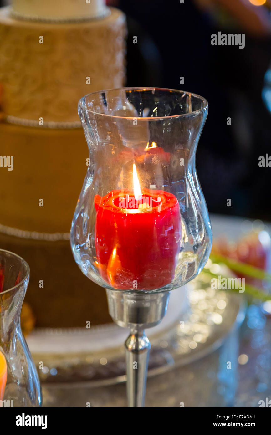 Wedding Reception Decor Of A Red Candle Lit And Producing