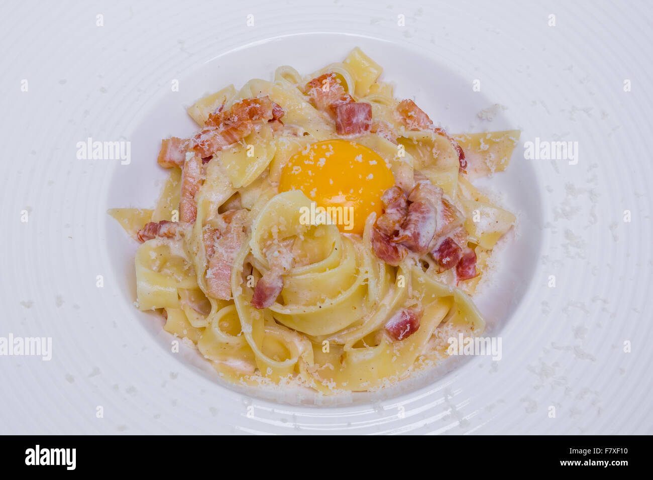 Pasta Carbonara With Parmesan Egg Yolk And Bacon Stock Photo Alamy