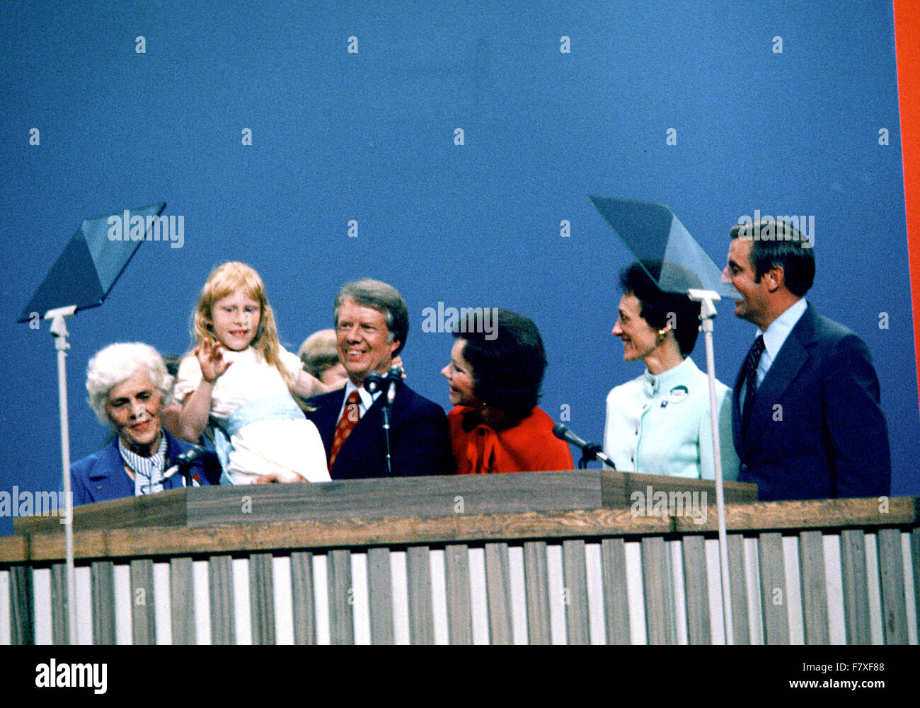 Governor Jimmy Carter (Democrat of Georgia), the 1976 Democratic Party nominee for President of the United States, following his acceptance speech at the 1976 Democratic Convention at Madison Square Garden, New York, New York on July 15, 1976. From left to right: Miss Lillian Carter, Jimmy Carter's mother; Amy Carter, daughter; Gov. Carter; wife Rosalynn Carter; US Senator Walter Mondale (Democrat of Minnesota), the 1976 Democratic Party nominee for Vice President of the US; and Mondale's wife, Joan Mondale. Credit: Arnie Sachs/CNP - NO WIRE SERVICE - Stock Photo