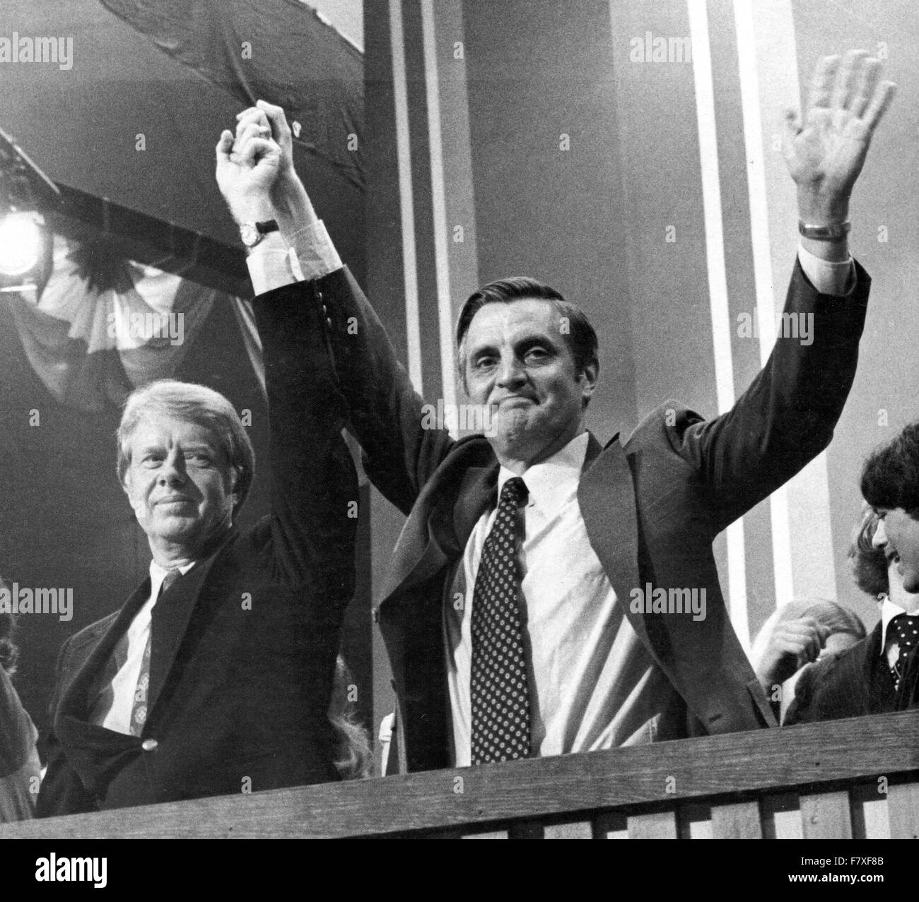 Governor Jimmy Carter (Democrat of Georgia), the 1976 Democratic Party nominee for President of the United States, left, and US Senator Walter Mondale (Democrat of Minnesota), the 1976 Democratic Party nominee for Vice President of the US, right, acknowledge the cheers of the delegates following their acceptance speeches at the 1976 Democratic Convention at Madison Square Garden, New York, New York on July 15, 1976. Credit: Frank Jurkoski/CNP - NO WIRE SERVICE - Stock Photo