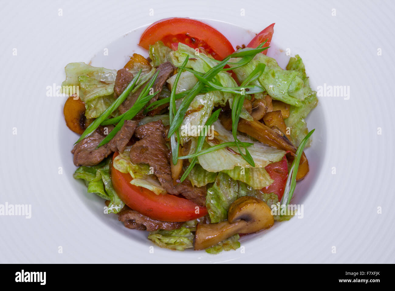 warm salad with veal and roasted mushrooms Stock Photo