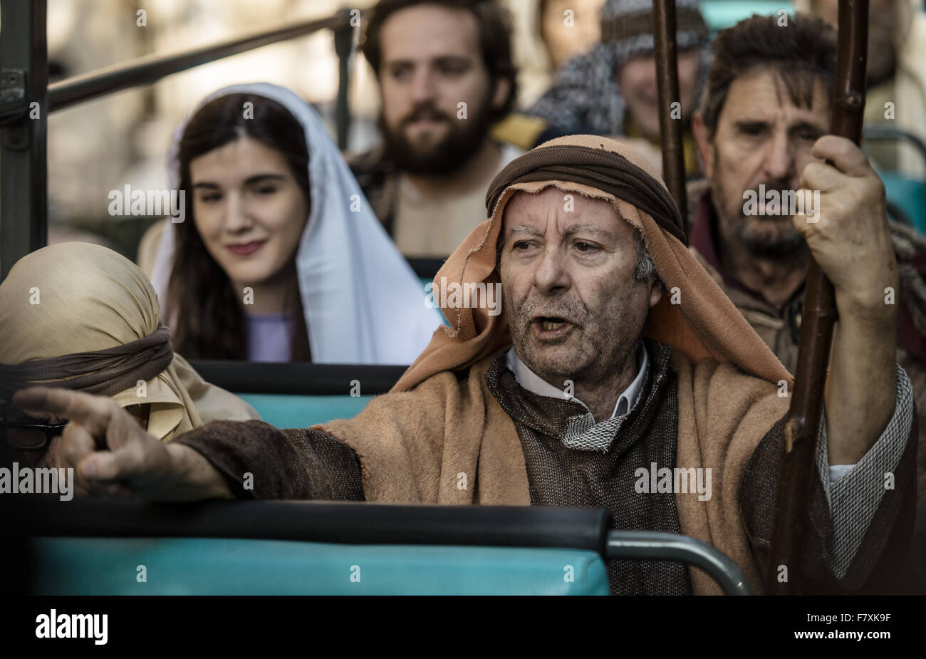 Barcelona, Catalonia, Spain. 3rd Dec, 2015. Shepherd performers of the 'pastorets', the traditional Catalan three part Nativity plays, visit Barcelona on the top of a tourist bus at the beginning of this years festival time. - The 'pastorets', an old Catalan tradition, tells the stories of Jesus birth, the battle of good (angel) vs. evil and a humorous piece about shepherds. © Matthias Oesterle/ZUMA Wire/Alamy Live News Stock Photo