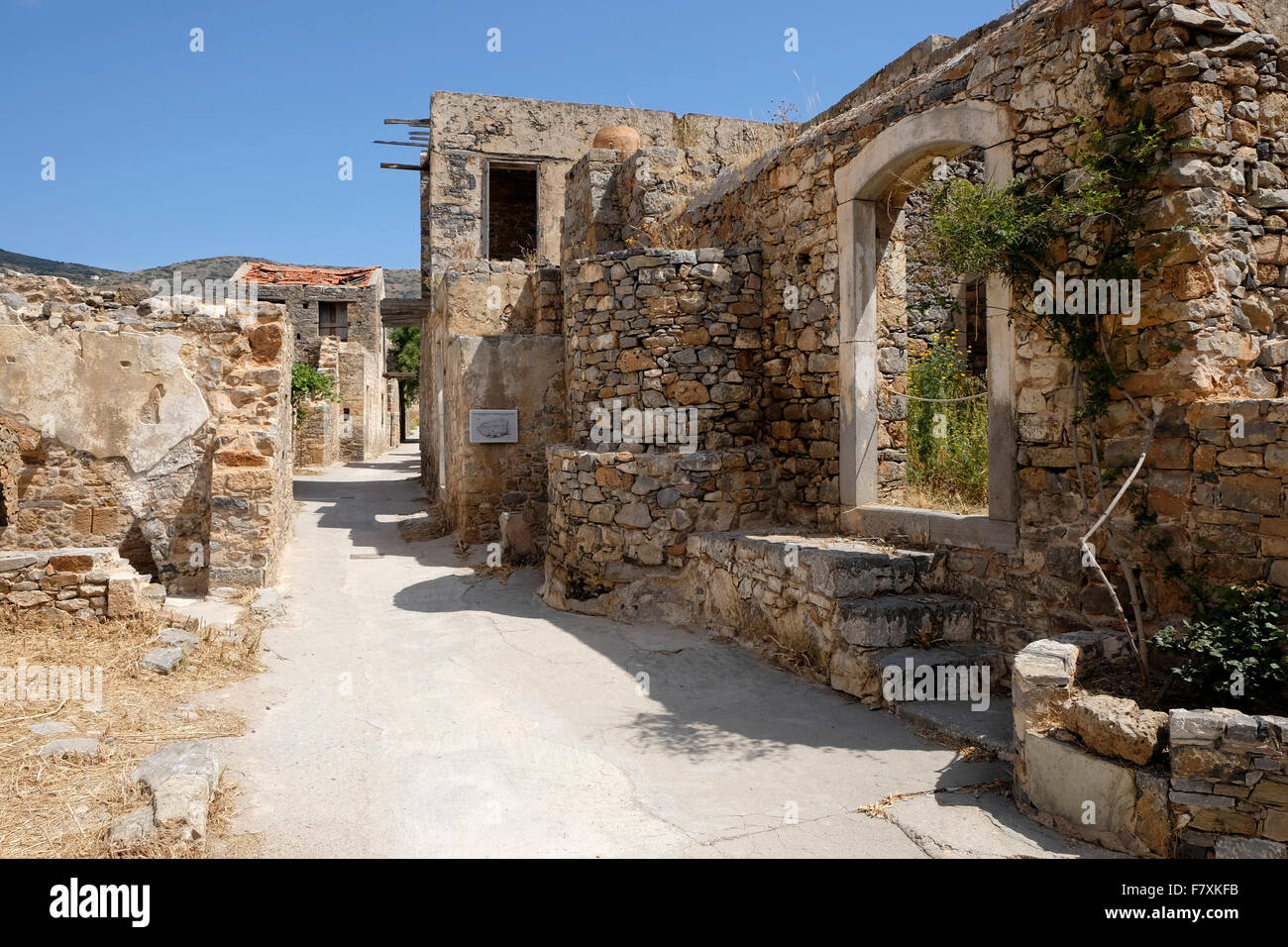 Ruined buildings on the Cretan island of Spinalonga. Stock Photo