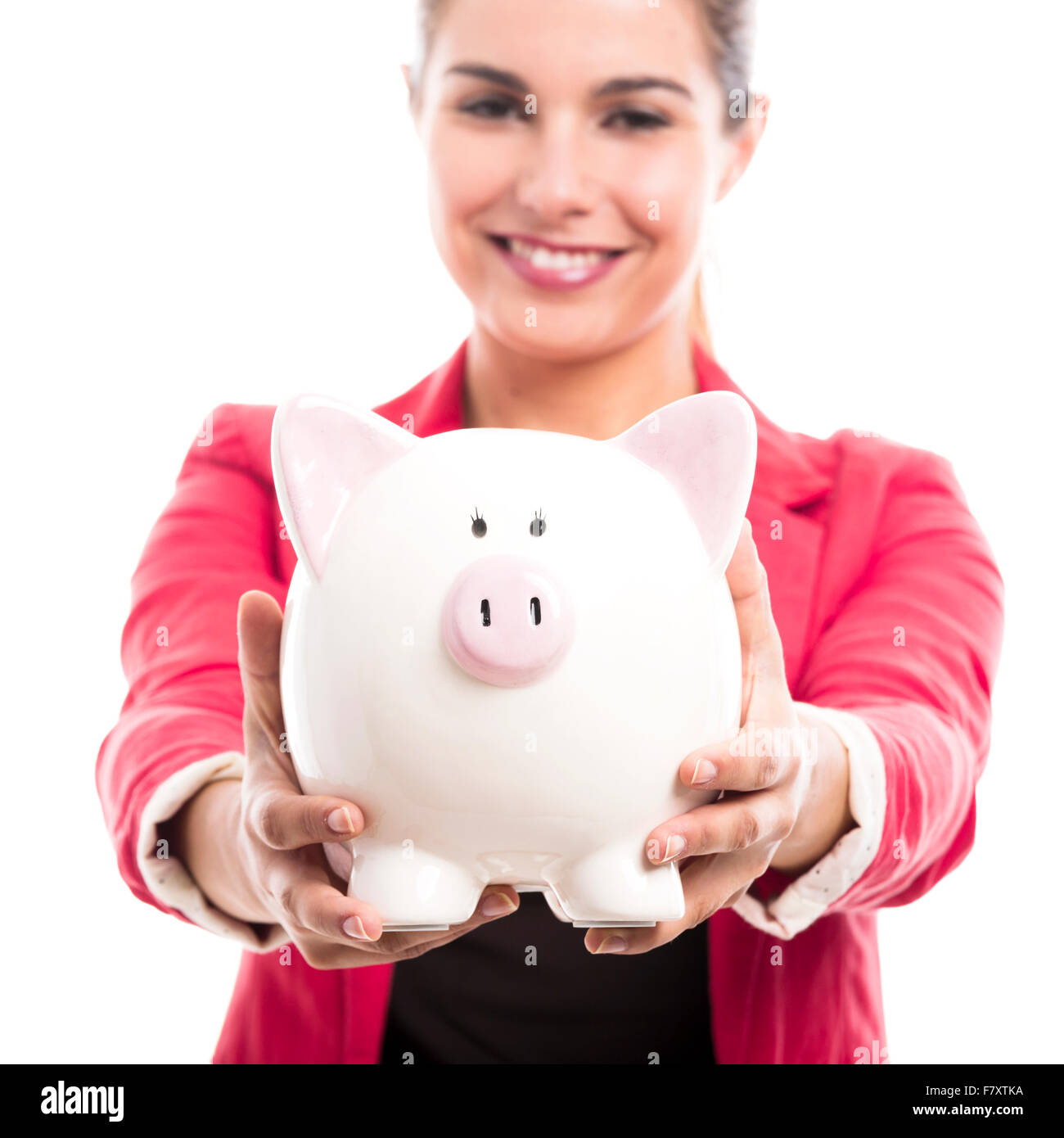 Business woman holding a piggy bank on the hands, isolated over a white ...