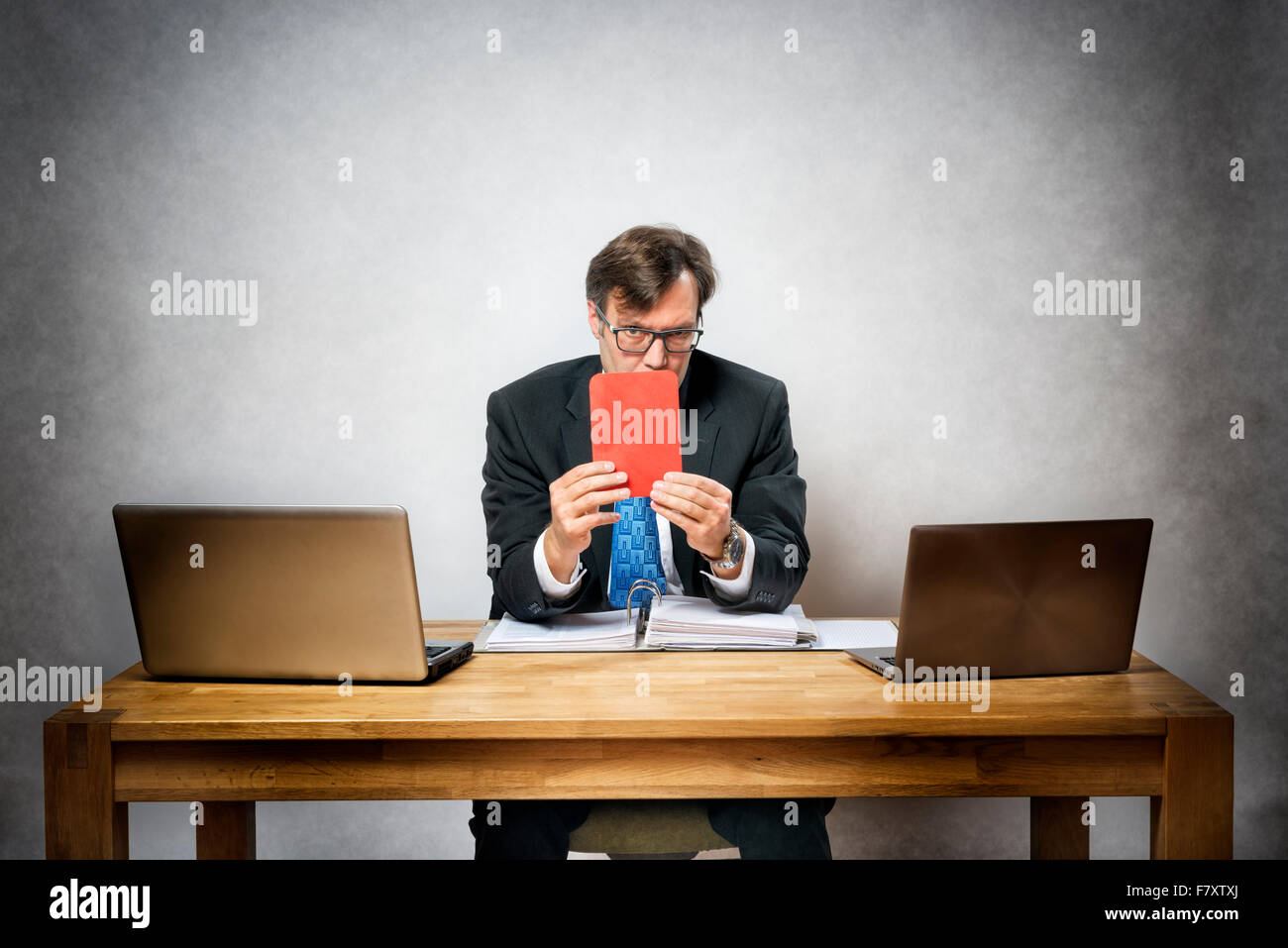 Image Of Business Man With Red Card In Office Stock Photo Alamy