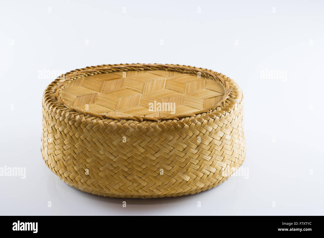 Bamboo rice basket on a white background Stock Photo