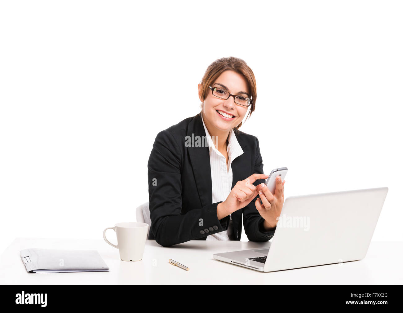 Beautiful and happy hispanic business woman in the office, isolated over a white background Stock Photo