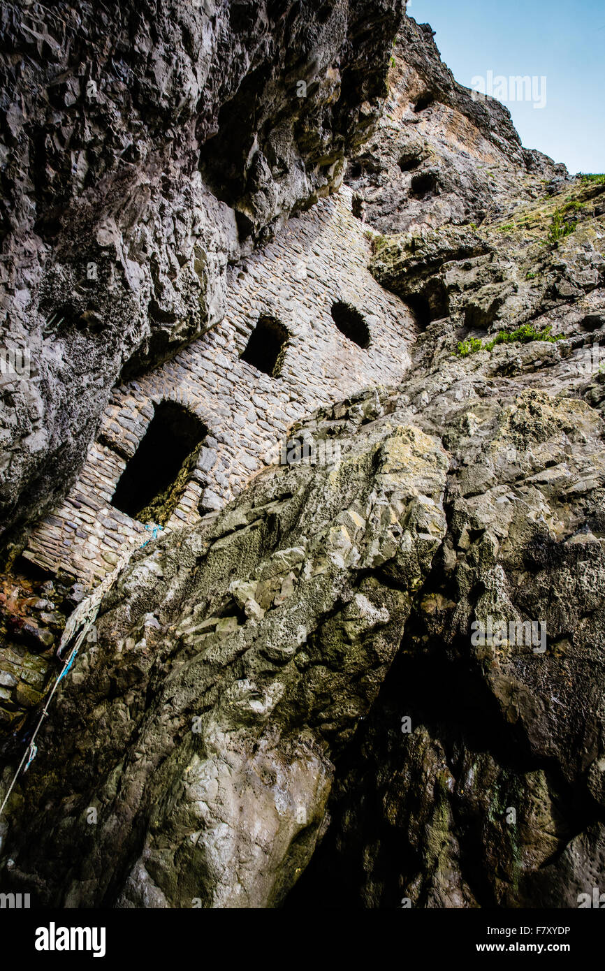 Culver Hole a historic dovecote built into cliffs near Port Eynon on the Gower peninsula in South Wales UK Stock Photo