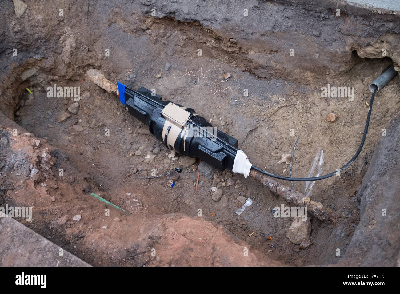Underground pipe repair on a UK street Stock Photo Alamy