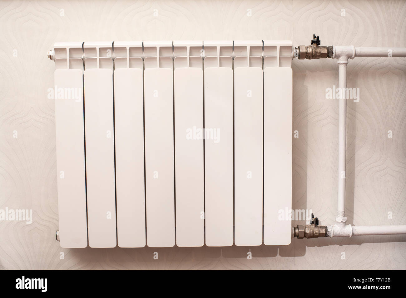 White iron radiator central heating in room Stock Photo Alamy