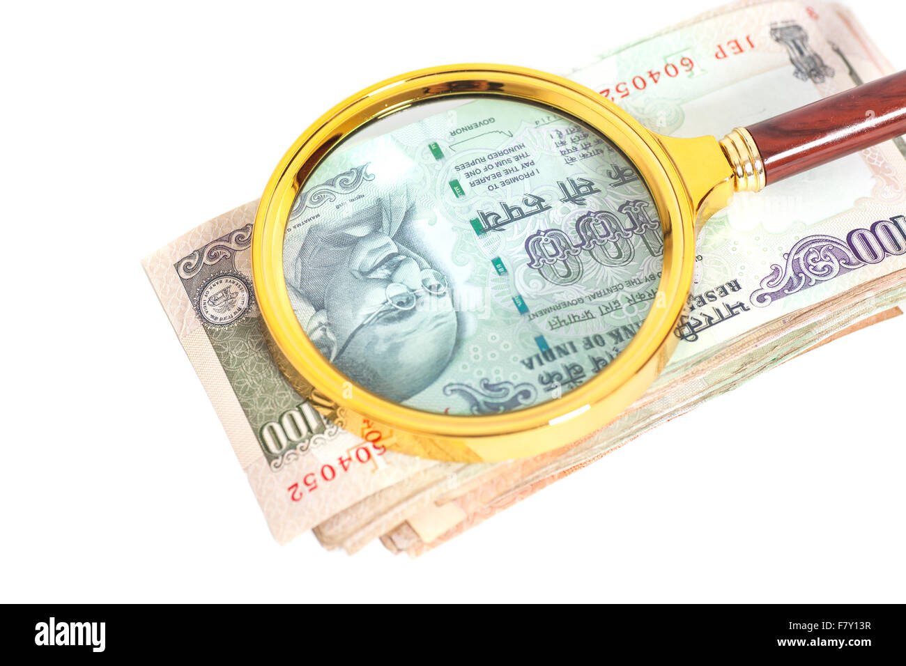 Indian Currency Rupee Notes with magnifying glass isolated on white ...