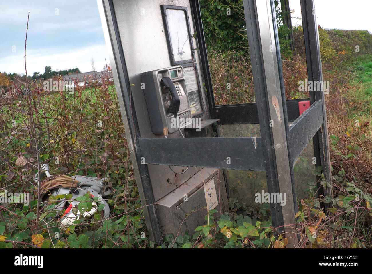 BT phonebox neglected dirty and overgrown in rural Herefordshire UK Stock Photo