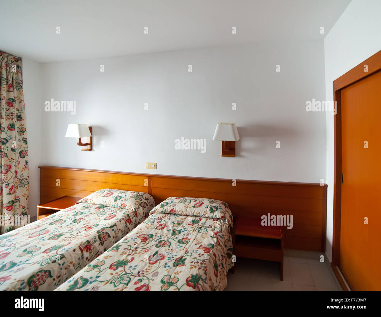 interior of bedroom with two bed Stock Photo - Alamy