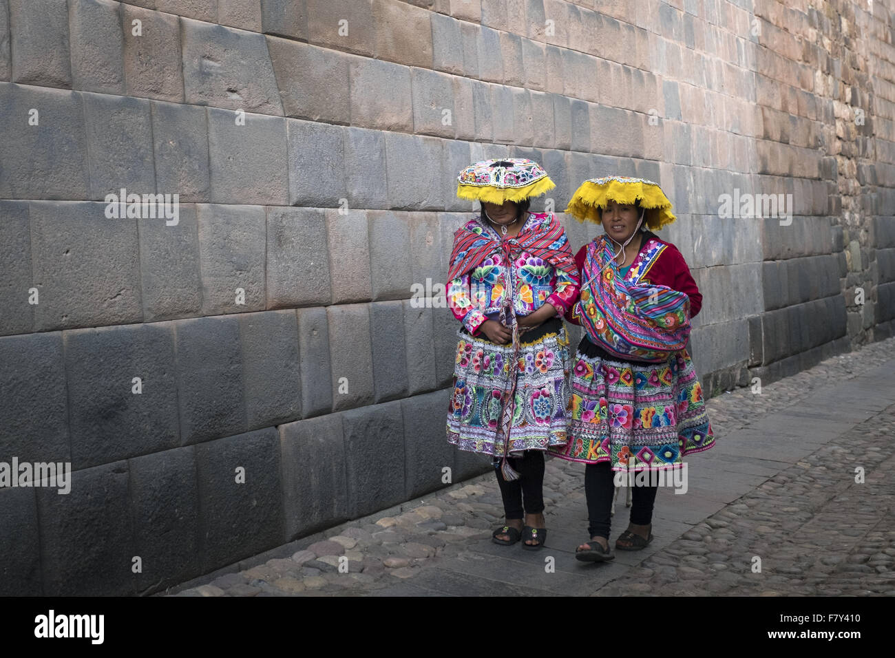 Several women through the city dressed in traditional costumes to take ...