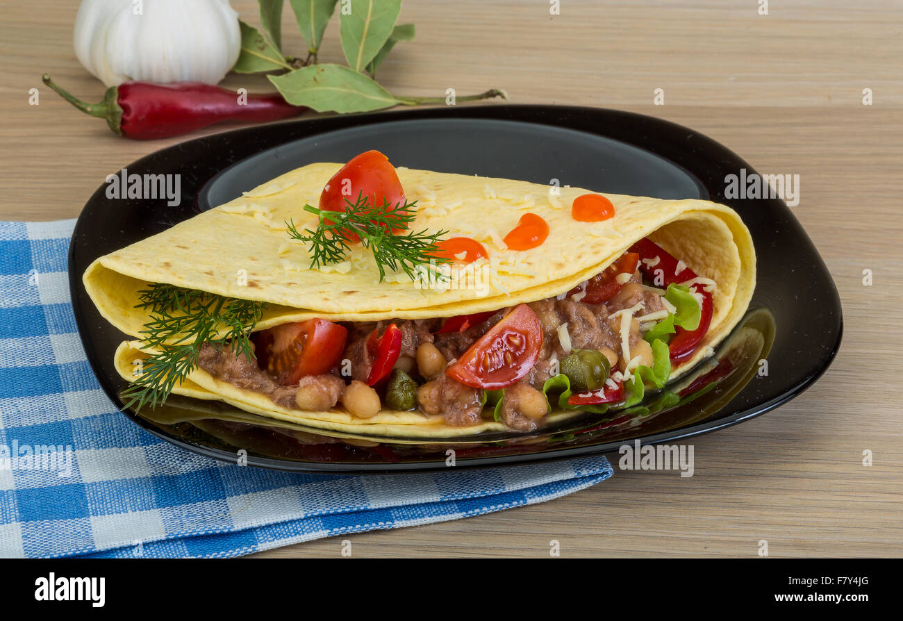 Mexican Tuna tortilla with bean and tomato Stock Photo Alamy