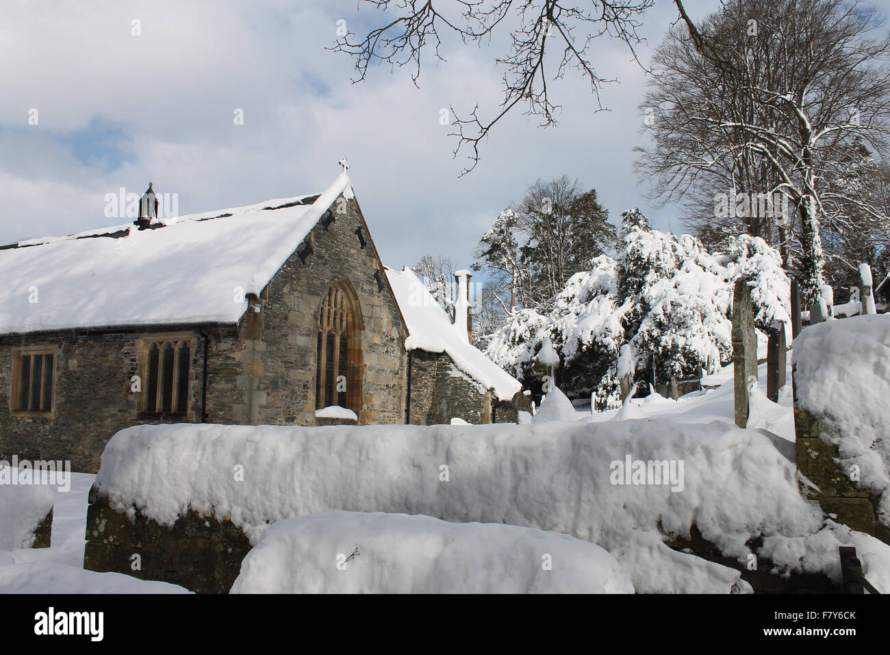 Llantysilio church graveyard and snow in winter Stock Photo