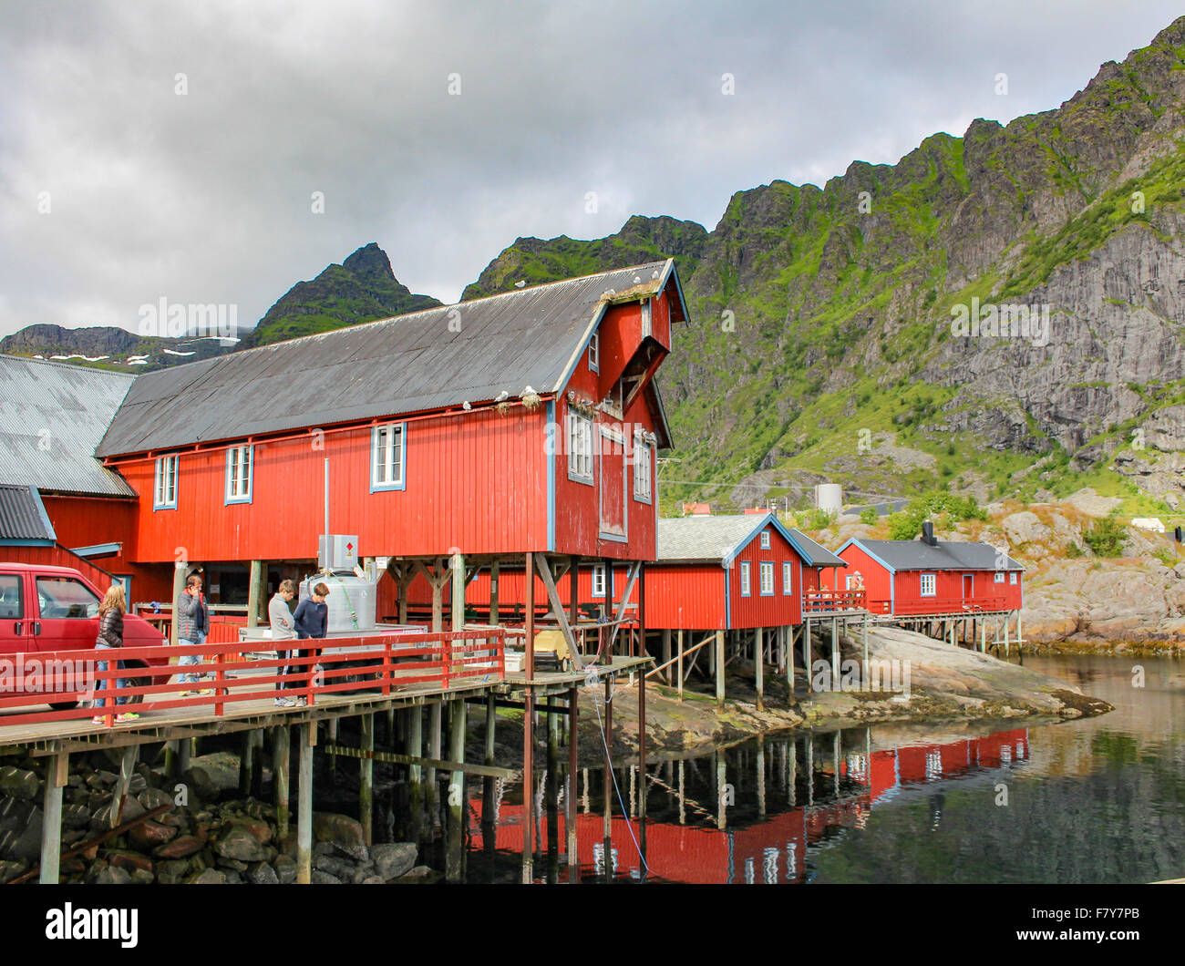 Quayside warehouse and jetty in the pretty fishing village of ' A ' in the western Lofoten Islands Norway Stock Photo